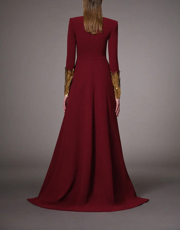 Burgundy Dress With Gold Feathers On Hem And Sleeves