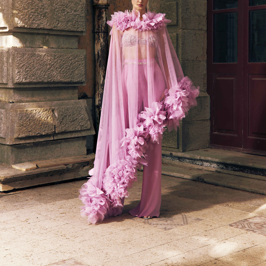 Silk georgette trousers with an embroidered bustier and an asymmetrical ruffled tulle cape